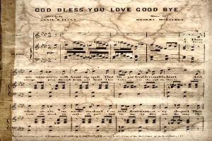 Ein altes Notenblatt mit der Aufschrift 'God Bless You Love Good Bye' und Noten und Symbolen.