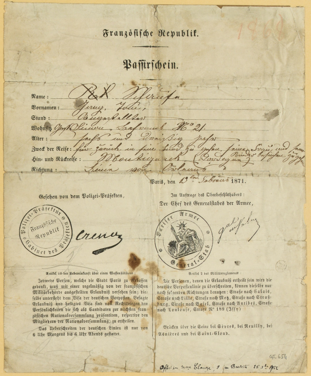 Altes vergilbtes deutsches Regierungsdokument mit einem kreisförmigen schwarzen Randstempel und schwarzer Tinte.