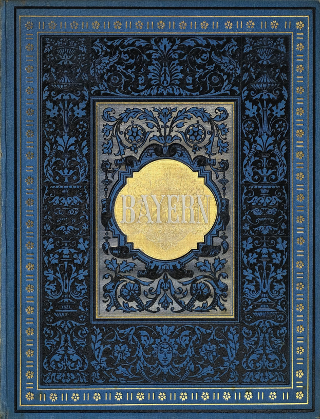 Ein blau-goldenes Buch mit dem Wort "Bayern" auf dem Cover, das mit detaillierten Verzierungen geschmückt ist.